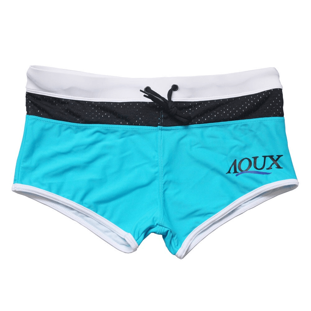 Blue men's drawstring low waist beach boxers with patchwork design, ideal for swimming. Stylish, breathable, and comfortable fit.